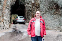 Alan Morris stood in front of a tunnel through the Needles Eye rock formation.