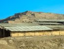 Burial mound at Pachacamac. In the background is the Temple of the Sun.