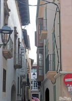Balconies overlooking each other above a narrow street in Palma Mallorca. Balconies overlooking each other above a narrow street in Palma Mallorca.