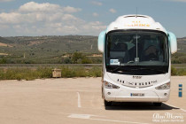 Coach stopped at a motorway service stop.