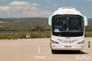 Coach stopped at a motorway service stop. Coach stopped at a motorway service stop.