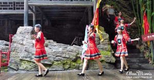 The bride's friends arrive to meet people at the Tribe of the 3 Gorges.