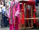 Matchmaker talks to the seated crowd at the Tribe of the 3 Gorges.