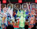 Characters performing in the Sichuan Opera & Folk Art show.