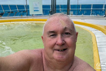 Alan Morris sat in a jacuzzi on the Costa Favolosa.