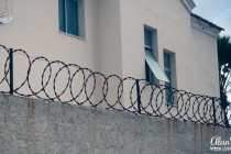 Razor wire sat on a lot of the walls around the beachside buildings in Recife.