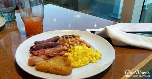 Bacon, sausage links, tomato, scramled egg & hashbrowns.