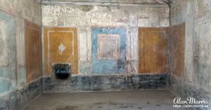 Colourful walls of a home in Pompeii.