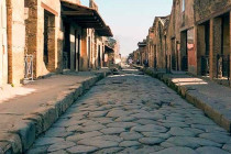 Long cobble stone paved road in Pompeii.