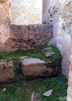 Bed in a Lupinare or brothel in Pompeii.