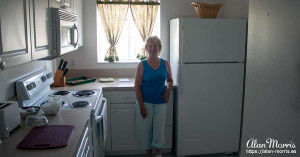 Jean Morris in the Kitchen of Alans' apartment at the Villages of Seaport.