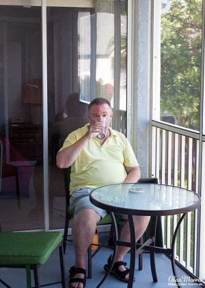 Alan Morris on the balcony of his apartment.