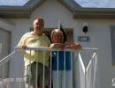 Jean & Alan Morris outside Alan's apartment in The Villages of Seaport.