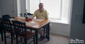 Alan Morris in his apartment at The Villages of Seaport