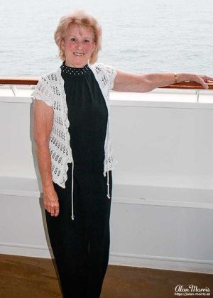 Jean Morris on the balcony of her cabin on the Queen Mary II.