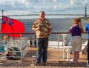 Alan Morris, with a beer, on the deck of the Queen Mary II.