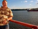 Alan Morris on the deck of the Queen Mary II as it leaves New York.