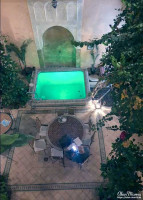 Alan Morris sat at a table in the courtyard of Riad El Falili. Alan Morris sat at a table in the courtyard of Riad El Falili.