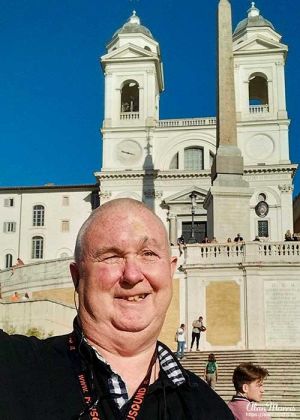 Alan Morris stood on the Spanish steps