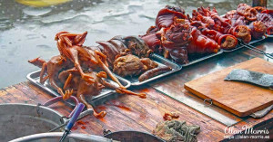 Assorted meats for sale on a stall in Louping Village on the Shennong Stream. Assorted meats for sale on a stall in Louping Village on the Shennong Stream.