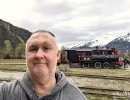 Alan Morris stood by a rail crossing in Skagway.