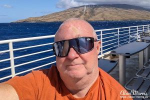 Alan Morris on deck of a boat at Maui, Hawaii.