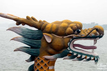 Dragon head figurine on the front of a dragon boat on Kunming Lake.