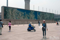 Giant video screens in Tiananmen Square.