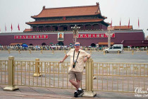Alan Morris stood in Tiananmen Square before the Forbidden City.