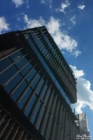 Clouds in a blue sky over building in Tokyo. Clouds in a blue sky over building in Tokyo.