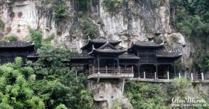 A wooden path follows the cliff face & leads to the Tribe of the 3 Gorges.