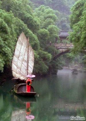 Boat on the Xiangxi River as we approach the Tribe of the Three Gorges.