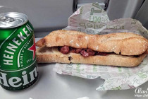 A beer & a bacon lettuce baguette