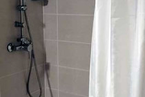 Shower in the bathroom at the Dormavalencia hotel in Valencia.