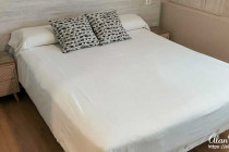 Bed in my hotel room at the Dormavalencia Hotel in Valencia.