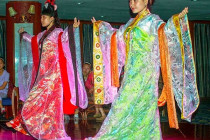 Victoria Selina staff in traditional costume for a fashion show.