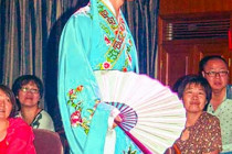 Staff member in the fashion show onboard the Victoria Selina.