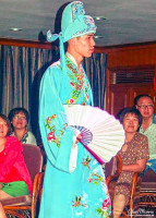 Staff member in the fashion show onboard the Victoria Selina. Staff member in the fashion show onboard the Victoria Selina.