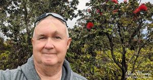 Alan Morris in front of a flowering shrub by the Steam vents near the Kilauea Visitor Centre.