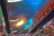 Large video screen that forms the roof of a shopping centre in Xi´an.