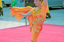 Acrobat performing in the Welcome Ceremony at Xián City Walls.