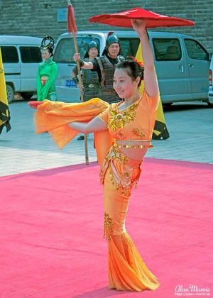 Acrobat performing in the Welcome Ceremony at Xián City Walls.