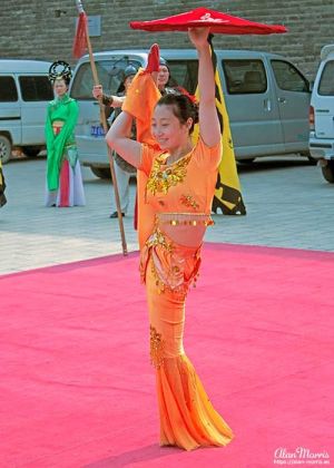 Acrobat performing in the Welcome Ceremony at Xián City Walls.